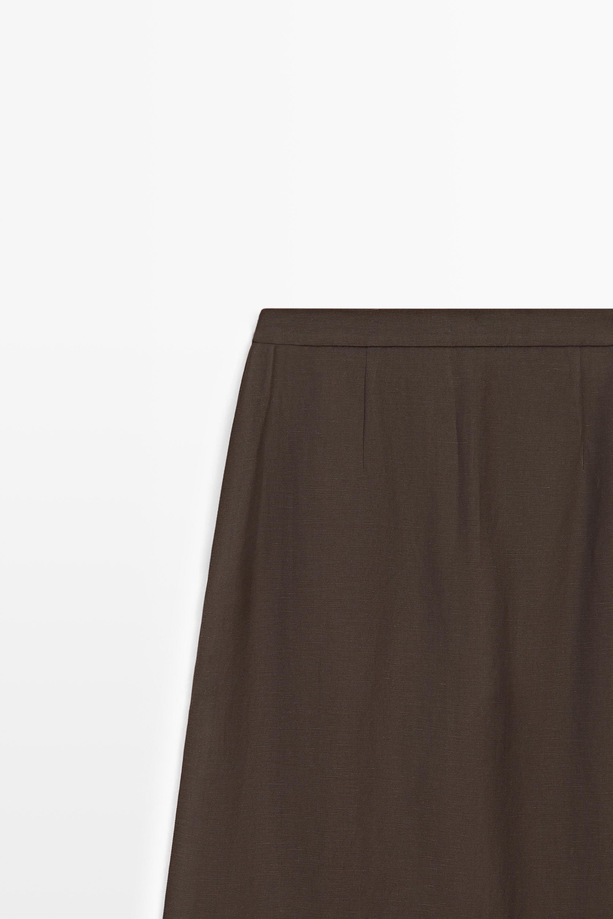 Flowing trousers with skirt detail